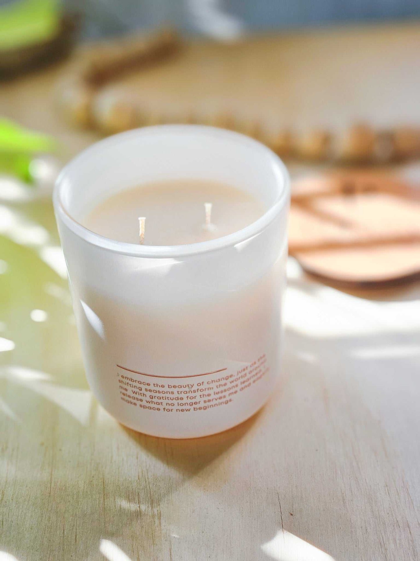 Essence of Fall handmade soy candle with affirmations on back.