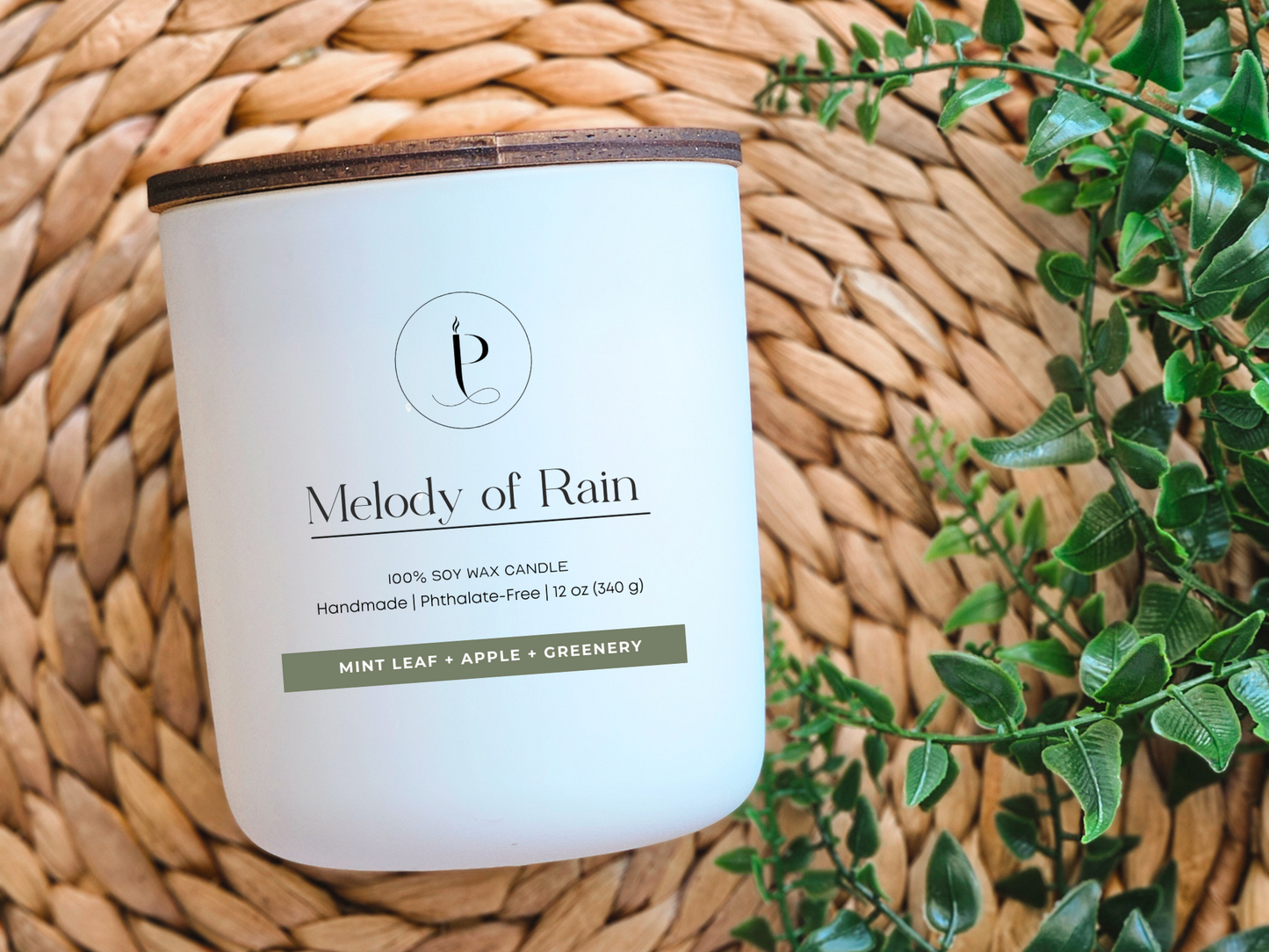 “Eco-friendly glass jar with bamboo lid holding Melody of Rain vegan soy wax candle”