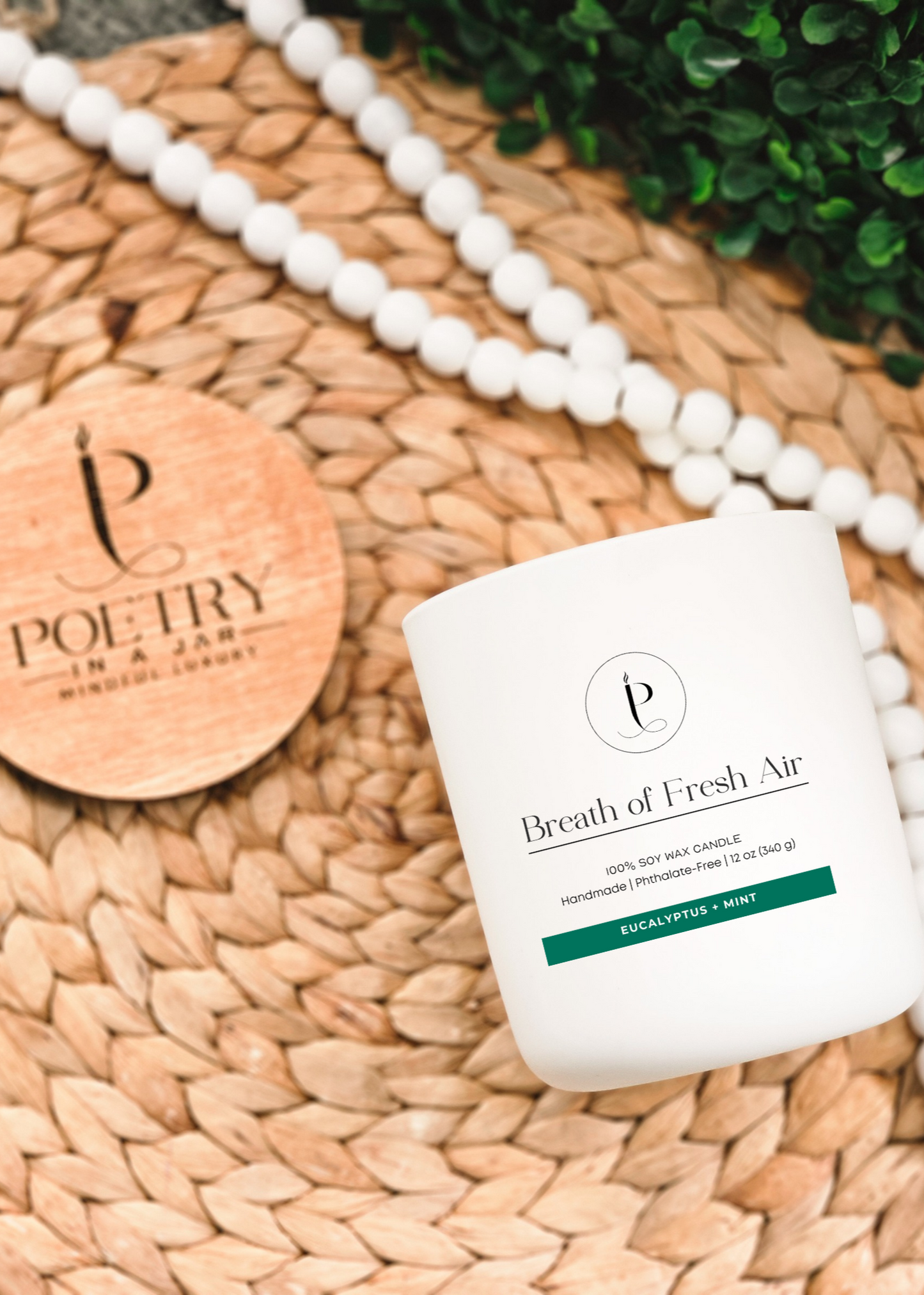 Close-up of Breath of Fresh Air candle label featuring uplifting poetry and clean design