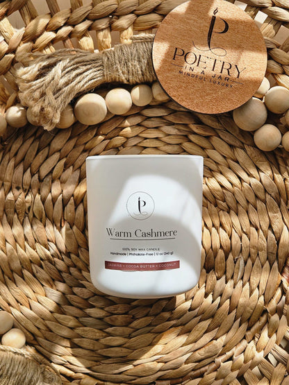 Close-up of Warm Cashmere label featuring poetic affirmation and fragrance notes