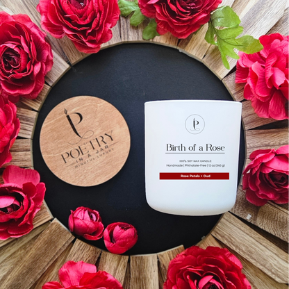 Birth of a Rose candle in glass jar with elegant rose-inspired poetic label